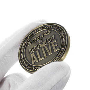 Двухсторонняя металлическая монета с латунным тиснением - Product Image 1