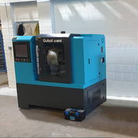 Tour CNC horizontal entièrement automatique Gubot pour redressage de jantes, machine de réparation de roues en alliage LSB300