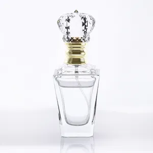 Dazzling Luxury 60ml unique design glass perfume bottle with gold crimp press pump and Crown Crystal topper and