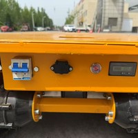 Chariot électrique portable télécommandé à chenilles avec direction flexible pour manutention en allées étroites de vergers
