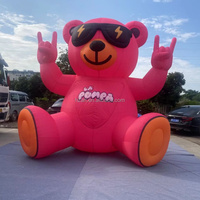 Ours rose gonflable personnalisé en forme d'animal de dessin animé avec lunettes de soleil pour la promotion publicitaire, les activités thématiques personnalisées, les fêtes