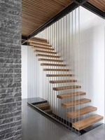 Escalier flottant en bois de chêne avec poutre cachée droite, design fantastique, avec balustrades et rampes en câble pour appartement