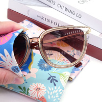 Usine en gros classique automatique élastique lunettes de soleil lunettes de lecture sac boîte étanche stéréo fleur Simple sac de rangement