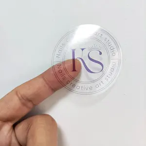 Votre nom d'entreprise ici conception gratuite Logo personnalisé autocollants Transparent vinyle imperméable étiquettes transparentes pour boîte d'emballage