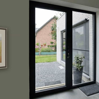 Portes françaises extérieures à double battant en aluminium avec grilles, design moderne, pour villa en verre