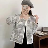 Nouveau Cardigan à carreaux à col rond tricoté pour femmes à la mode pour femmes automne-hiver manches longues manteau polaire pull chaud