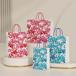 Wholesale Designer Customized Luxury Classic Durable Shopping Kraft Paper <b>Bag</b> <b>Gift</b> <b>Bag</b> Packaging with Custom Logo - Product Image 1