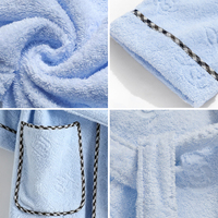 Peignoir de luxe en coton éponge, col châle, bleu ciel, confortable et durable, idéal pour les centres de villégiature et l'usage quotidien, sur mesure pour femmes