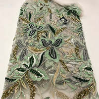 Tissu en dentelle brodée de sequins