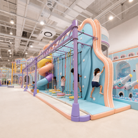 Équipement de terrain de jeu intérieur sur le thème des macarons, couleurs pastel, jeux d'escalade pour enfants, mur d'escalade, toboggan en acier inoxydable, fosse à balles, usage commercial