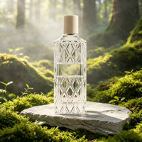 Flacon pulvérisateur de parfum en verre transparent en gros, 100 ml, forme cylindrique, distributeur cosmétique vide