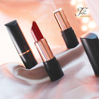 Tube de rouge à lèvres rond de couleur balle rouge brillant noir et or de luxe de marque privée unique
