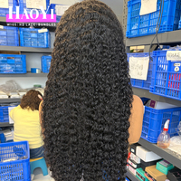 Perruques bouclées brésiliennes 100 % naturelles, cheveux humains vierges Remy non traités, avec dentelle frontale HD 13x4, pour la vente en gros