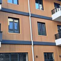 WPC persienne cannelée décoration extérieure mur et porte bardage façade bois plastique panneau mural composite