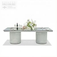 Table à manger moderne en fer avec plateau en verre et piédestal double cannelé pour la location événementielle – Fournisseur direct d'usine pour commandes en gros