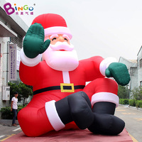 Grand modèle publicitaire gonflable de Père Noël assis, personnalisé, géant, avec LED, pour la décoration de jardin et de fêtes de Noël