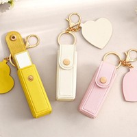 Lippenbalsam-Schlüsselanhänger, Niedlicher Blanko-Leder-Schlüsselanhänger, Individuelles Logo Lippenstift-Schlüsselanhänger, Großhandel Designer-Schlüsselring, Luxus-Taschenanhänger