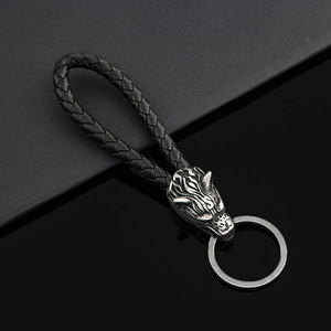 Porte-clés en acier inoxydable yunnique avec tête de loup, cordon en cuir tressé rétro, accessoire pour clés de voiture - Product Image 1
