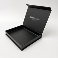 Boîte cadeau magnétique noire en forme de livre pour l'emballage de vêtements, boîte en papier rigide mat avec couvercle rabattable, boîte vide en gros
