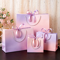 Sac en papier de luxe pliable avec poignées personnalisées, design élégant, pour emballage et cadeaux, prix usine