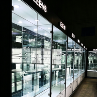 Vitrine en verre trempé personnalisée avec éclairage LED et finition émaillée pour magasins de proximité, tabac et alcool