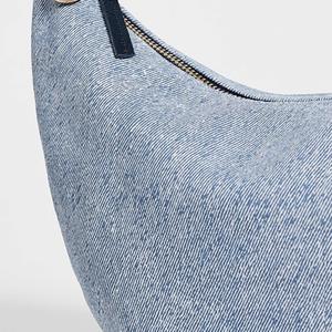 กระเป๋าถือผู้หญิงลายโลโก้สีฟ้าอ่อน รุ่น Lady Lune แบบสะพายไหล่เดียว มีซิป แฟชั่นคลาสสิก ใช้ได้ทุกฤดู ทั้งฤดูร้อน ฤดูหนาว ฤดูใบไม้ร่วง - Product Image 2