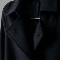 Nouveau manteau long noir pour femme, style minimaliste populaire, explosif, pour la chaleur et la protection contre le vent
