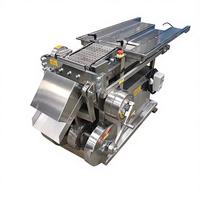 Machine de découpe à mouvement alternatif pour tabac commercial, à longueur réglable, pour le traitement en profondeur des feuilles et tiges de tabac (matière première)