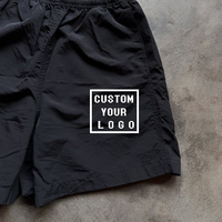 Shorts en nylon noir froissé à séchage rapide avec cordon de serrage, imprimé logo personnalisé, pour la natation, la course, la gym, vêtements de sport, coupe ample pour hommes