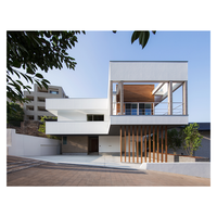 Villa préfabriquée de luxe à deux étages Structure en acier de haute qualité Matériau de conteneur Panneau sandwich Maison préfabriquée meublée