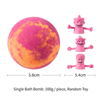 Bombes de bain aux huiles essentielles multicolores en boîte et boules de sels effervescents