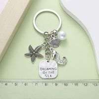 Porte-clés personnalisé avec breloque nautique, pendentif en métal argenté représentant la vie marine, souvenir de voyage créatif pour l'été, cadeau directement de l'usine