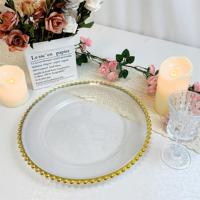Assiette de présentation ronde personnalisée en plastique transparent et perles dorées, design moderne, durable et écologique, vente en gros