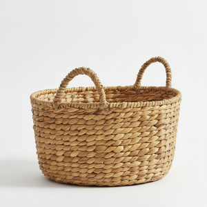 Cesta de jacinto de agua de Vietnam hecha a mano ecológica 100% diseño ovalado con asas Ideal para almacenamiento doméstico y decoración del hogar - Product Image 1