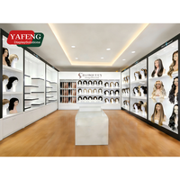 Présentoirs et vitrines sur mesure de haute qualité pour salons de coiffure et perruques, fournis par un fabricant de Guangzhou