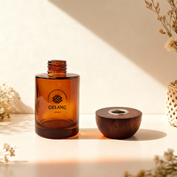 Bouteille de diffuseur de Offre Spéciale 100ML bouteilles de diffuseur rondes bouteille de diffuseur de roseau de luxe en verre ambre 150ML avec bâton de roseau
