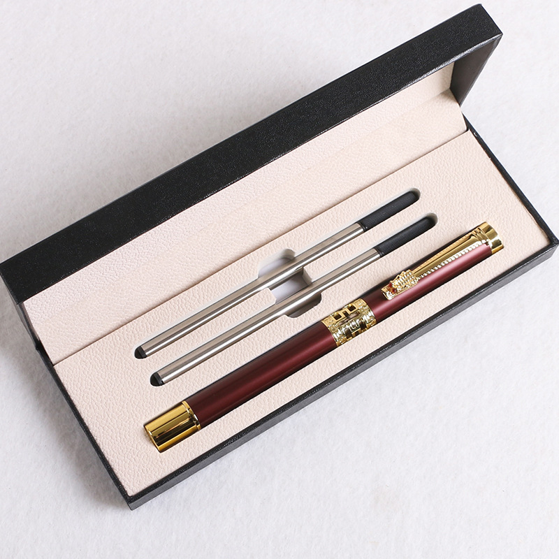 Caja de regalo + pluma de firma roja