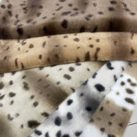 Beliebter 100% Polyester Xiaomi Imitat-Nerz Schneeleoparden-Punktmuster Atmungsaktiver Schwerer Gestrickter Trikot-Stoff für Jungen