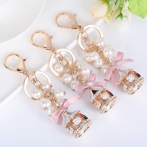 Dainty Pearl Girls Carousel Keychain Rhinestone Merry Go Bag Hanging Accessory Crystal Material Silk Screen Printing for Gifts - Product Image 3