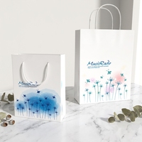 Sac de shopping en papier de luxe personnalisé avec logo imprimé, cordon de serrage et poignée, fabriqué par un fabricant à prix abordable