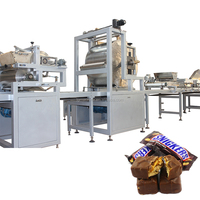 Ligne de production entièrement automatique de barres chocolatées Snickers et de barres protéinées