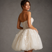 Robe de mariée courte à ourlet bouffant, bustier, avec corset transparent et appliques en dentelle, en tulle, pour réception de mariage, sur mesure, vente en gros