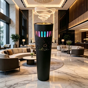 Fontaine d'eau moderne noire sur pied avec lumières LED colorées et découpes florales, élément aquatique d'intérieur pour la décoration de la maison et du bureau - Product Image 1