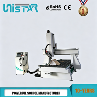 Routeur CNC automatique avec ATC et aspiration 9 kW pour la fabrication de portes d'armoires et le travail du bois