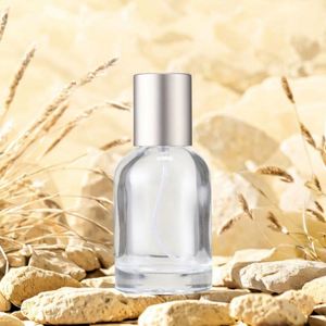 Flacon de parfum en verre cylindrique transparent de luxe 30 ml, fond épais volcanique, avec pulvérisateur à pompe sérigraphié, personnalisable - Product Image 1
