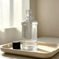 Bouteille diffuseur à roseaux en verre transparent avec bouchon à vis nervuré noir, logo LUMINARA doré en relief, conteneur de parfum vide de luxe