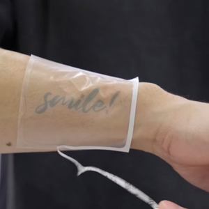 Smile semipermanente personalizar al por mayor caja de tinta rosa sin transferencia de agua 2 horas activar 15 días T tatuaje temporal