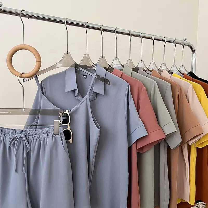 Été nouveau tempérament de couleur unie chemise à col POLO à manches courtes + bretelles courtes + short à jambes larges ensemble trois pièces