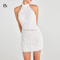 Vente en gros de produits de luxe haut de gamme de haute qualité Boutique élégante robe dos nu à franges perlées glands Mini robe de cocktail blanche pour femmes