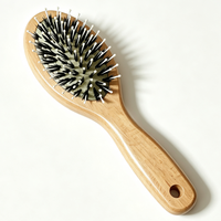 Brosse à cheveux démêlante et lissante à coussin d'air avec manche en bois de hêtre, poils de sanglier naturels et picots en nylon pour massage du cuir chevelu